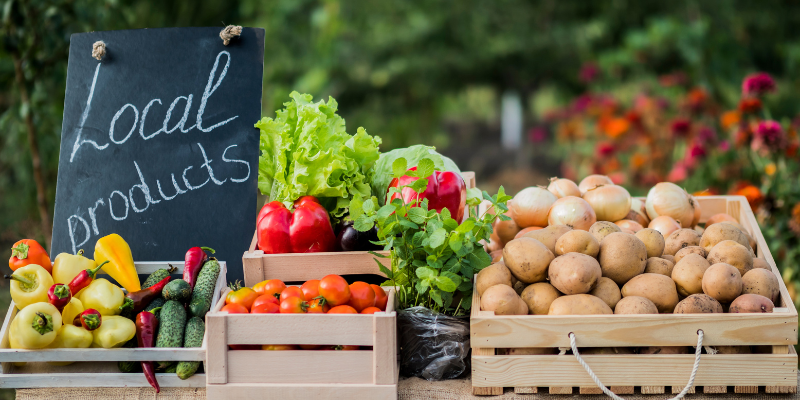 local fruits and vegetables in bins