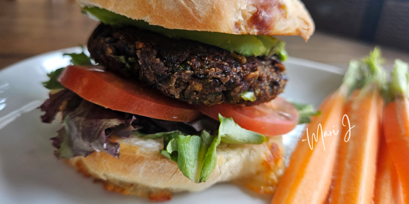 Black Bean Burger with Carrots on a plate