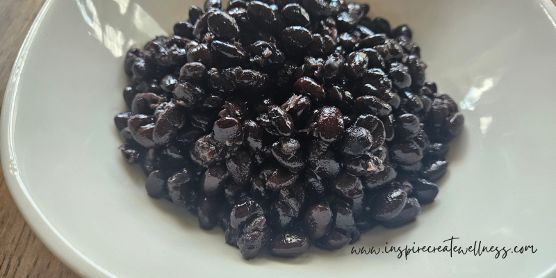 Cooked Black Beans in a white bowl