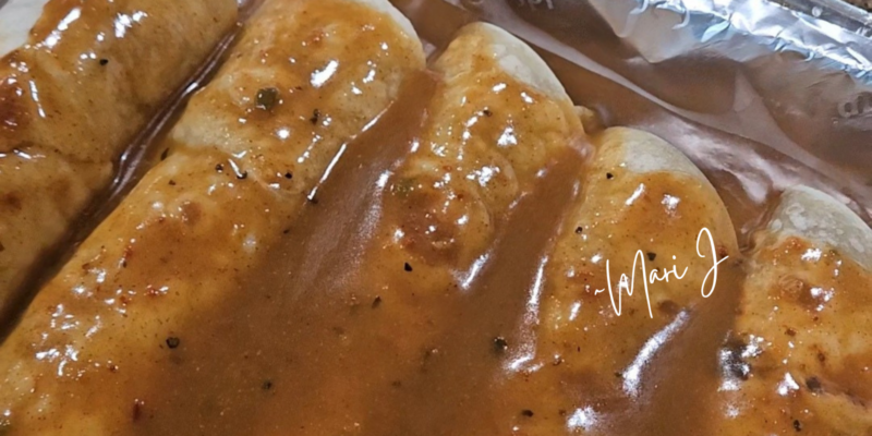 Enchilada Sauce poured on top of flour shells