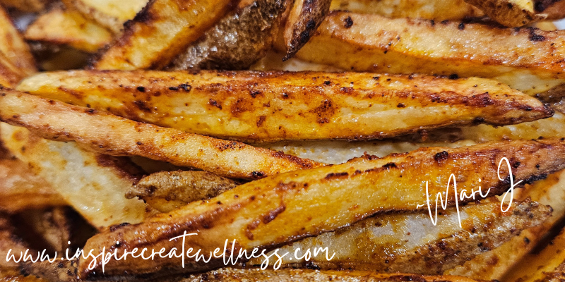 The Best Naturally Cut Fries made at home on a white plate