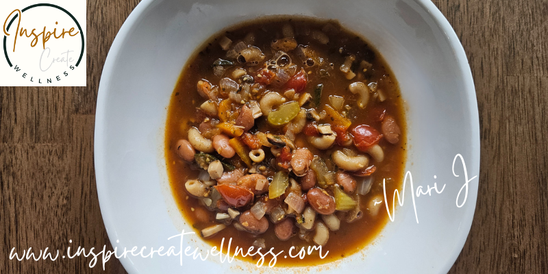 Hearty homemade minestrone soup in a white bowl