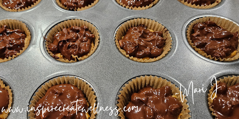 Melted Dark Chocolate on top of Peanut Butter for homemade peanut butter cups