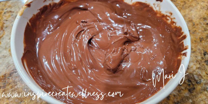 Melted Dark Chocolate and Coconut Oil in a white bowl