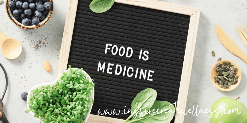 Food Is Medicine sign with vegetables