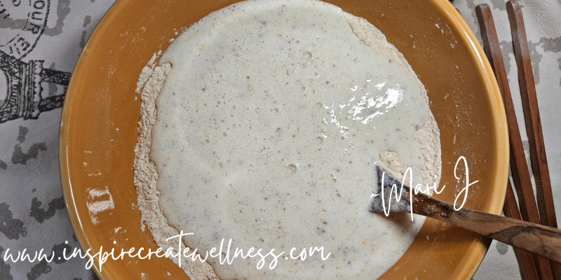 Blueberry Kefir Pancakes - wet and dry ingredients in a large bowl.