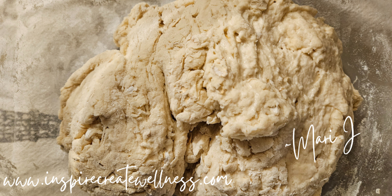 Easy Honey Oat Bread Dough in a large glass bowl on the counter