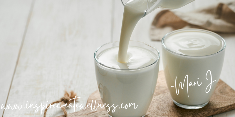 Homemade Kefir being poured into a glass cup